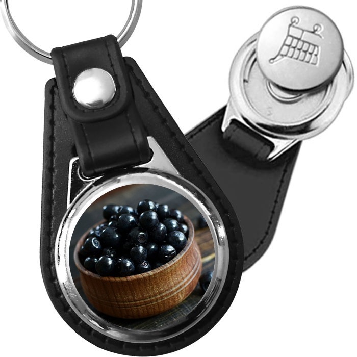Porte-clé cuir avec médaillon fruit Cassis