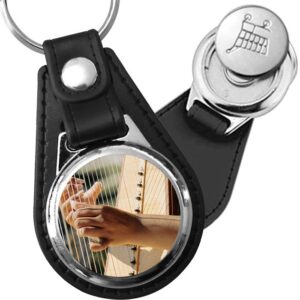 Porte-clé cuir avec médaillon instrument Guimbarde
