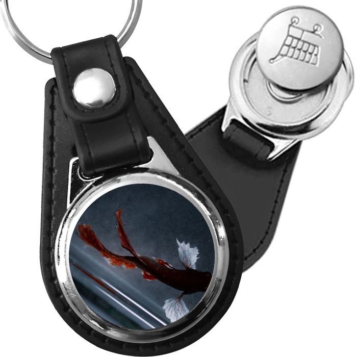 Porte-clé cuir avec médaillon poisson Guppy