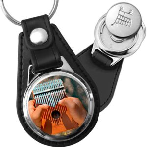 Porte-clé cuir avec médaillon instrument Kalimba