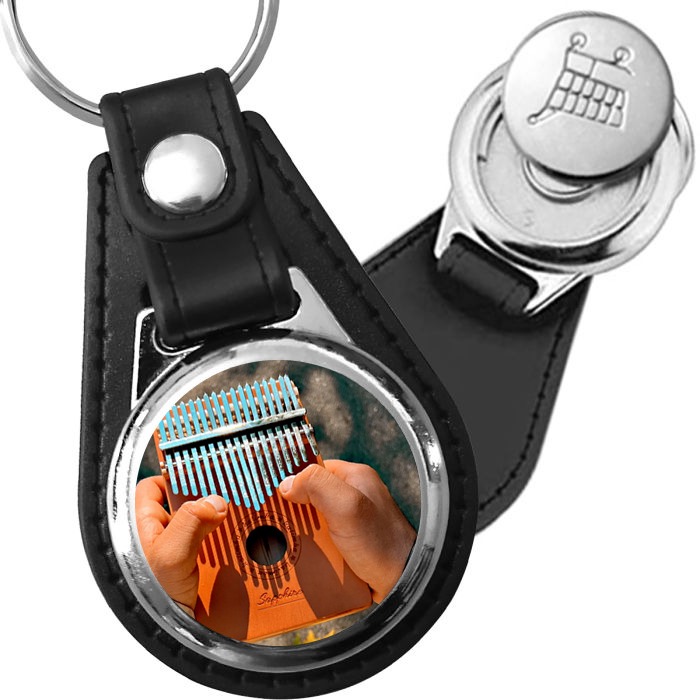 Porte-clé cuir avec médaillon instrument Kalimba