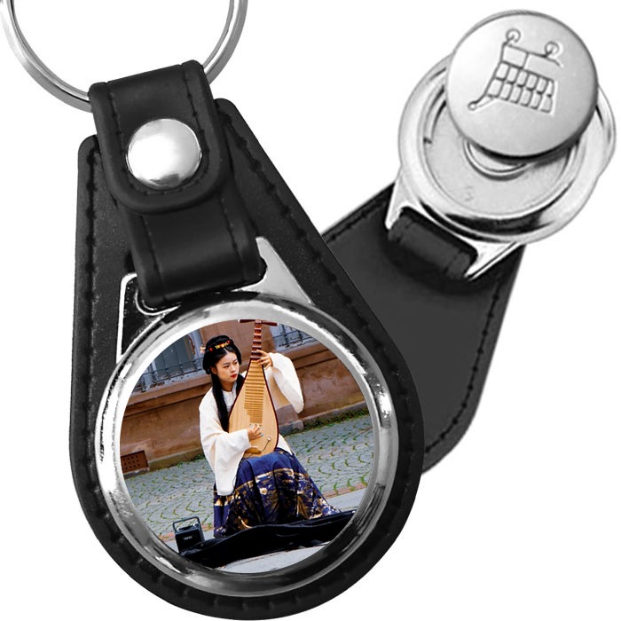Porte-clé cuir avec médaillon instrument Luth