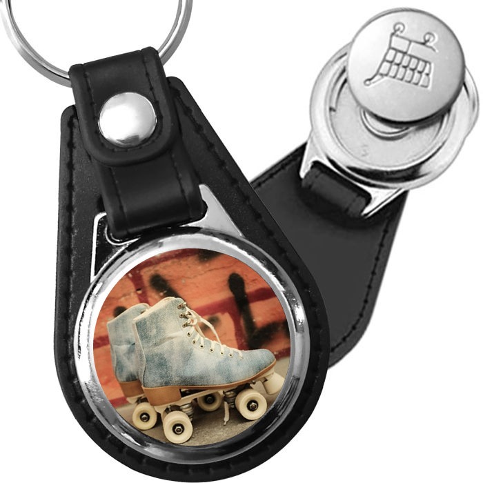 Porte-clé cuir avec médaillon sport Roller