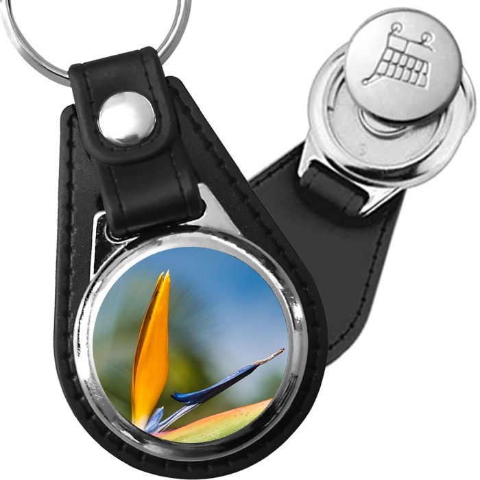 Porte-clé cuir avec médaillon fleur Strelitzia